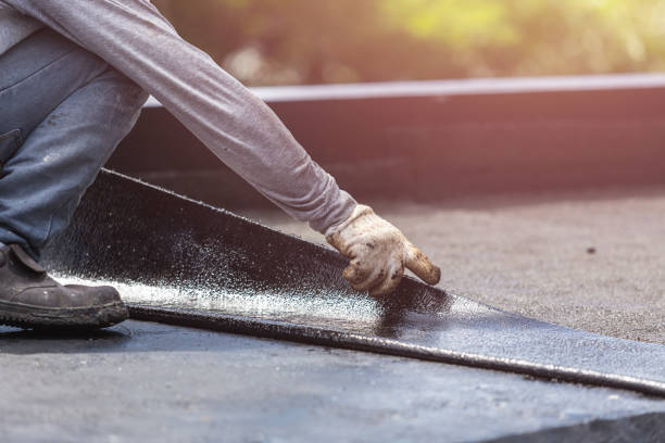 Professional Basement Waterproofing technician working in Victoria, KS